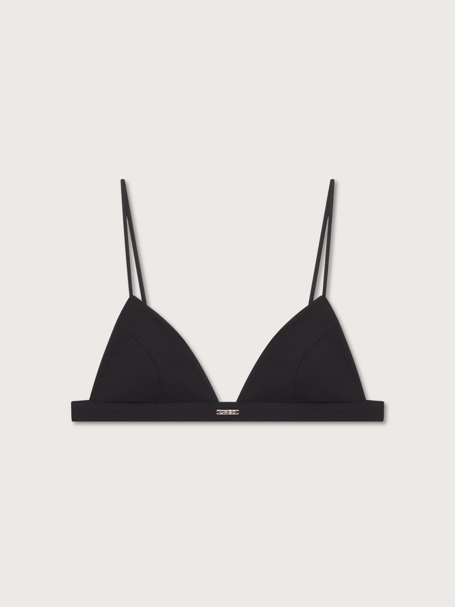 Black soft cup bra with thin straps on a light gray background