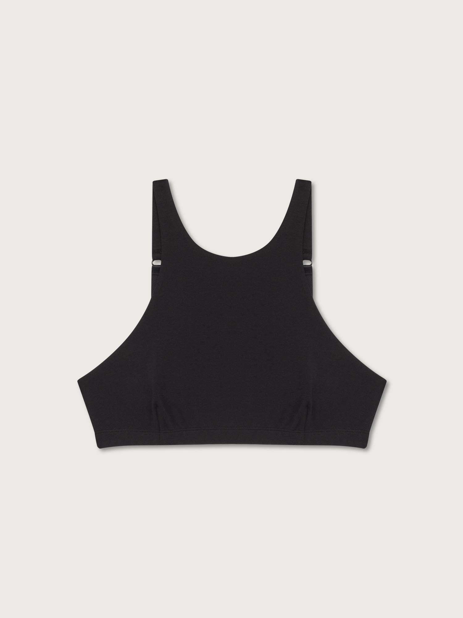 Black halter top on a light gray background