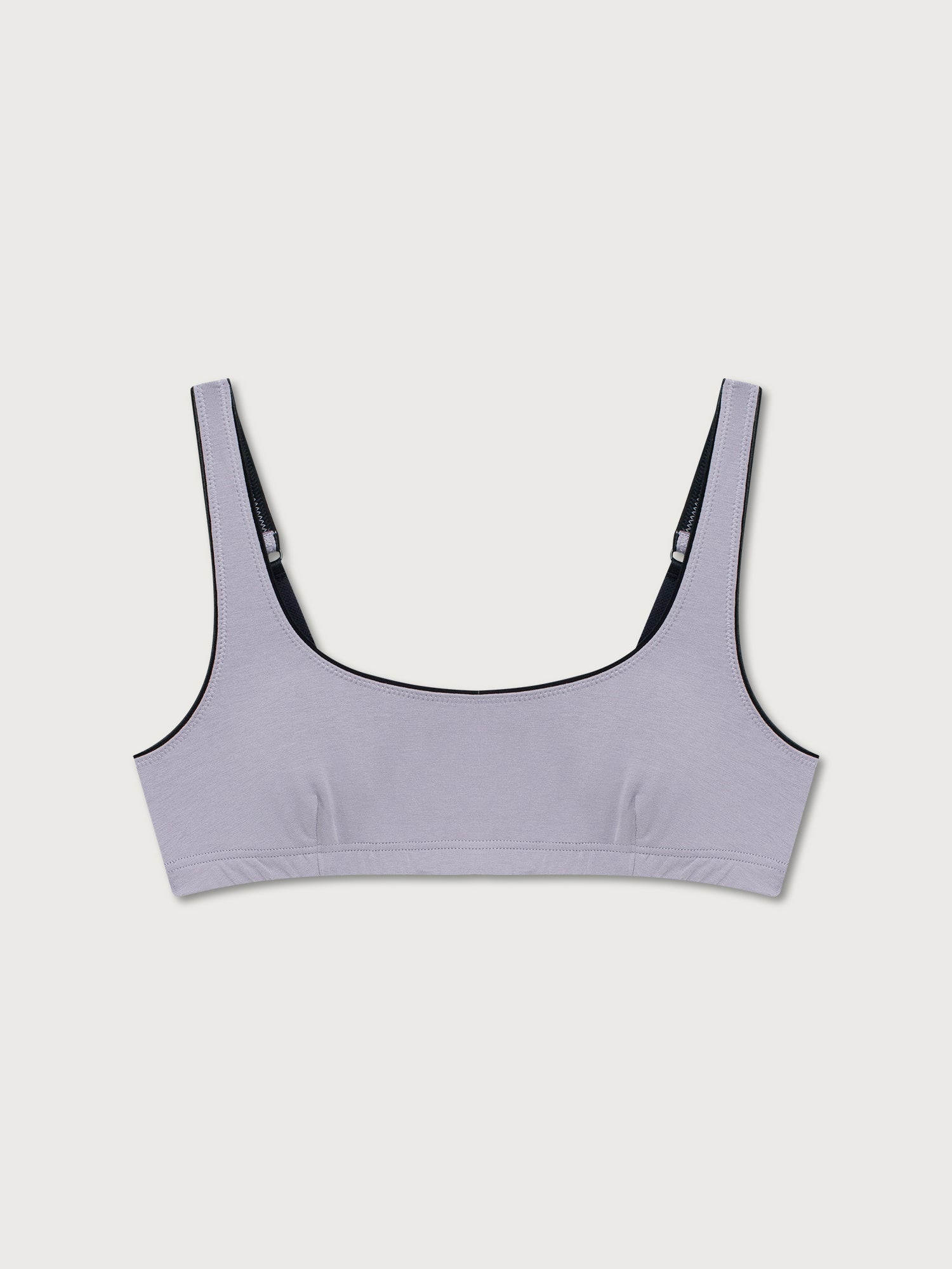 Lilac underwear bra on a light gray background
