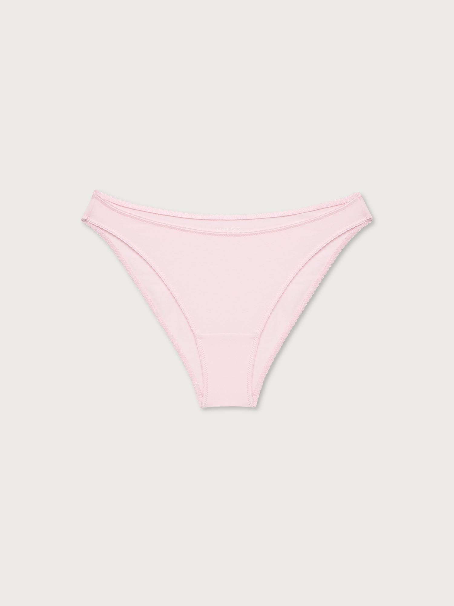 Pink bikini undies on a light gray background